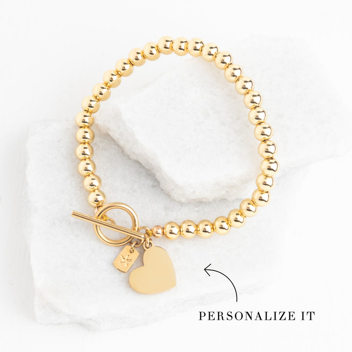 Engravable Heart Pendant on Handbeaded Gold Bracelet