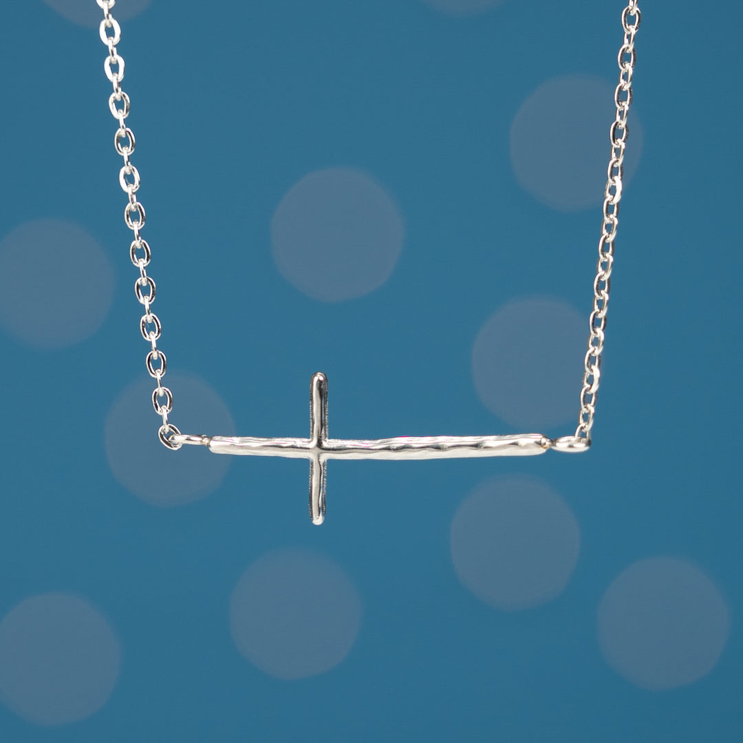 Radiant Cross Necklace in Silver