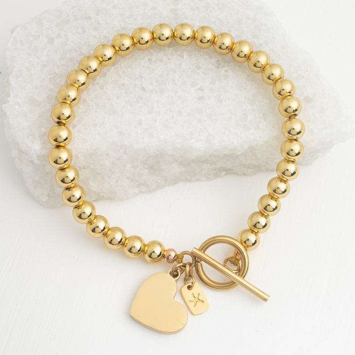 Engravable Heart Pendant on Handbeaded Gold Bracelet