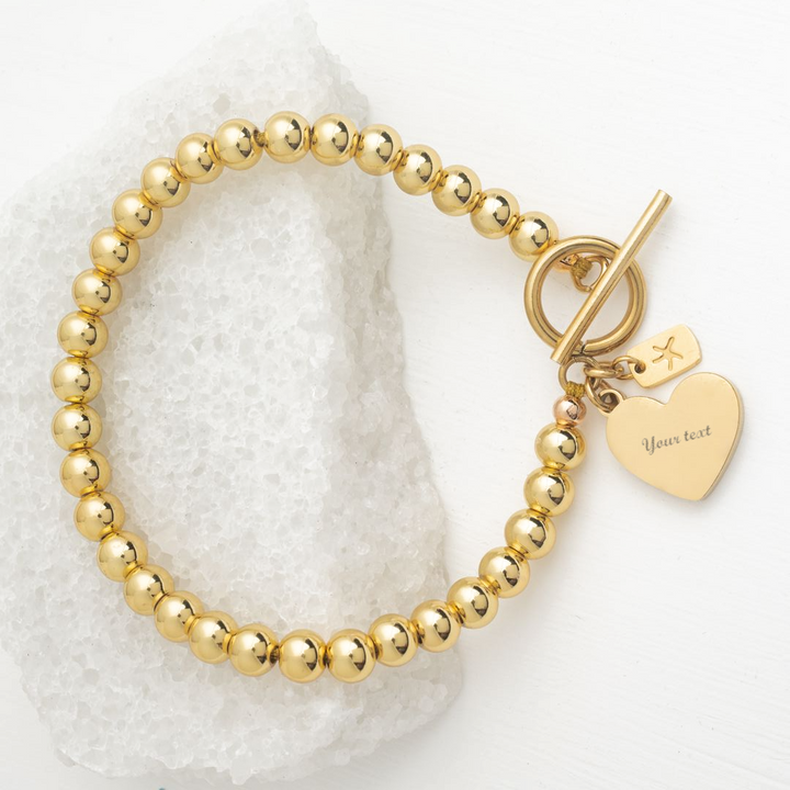 Engravable Heart Pendant on Handbeaded Gold Bracelet